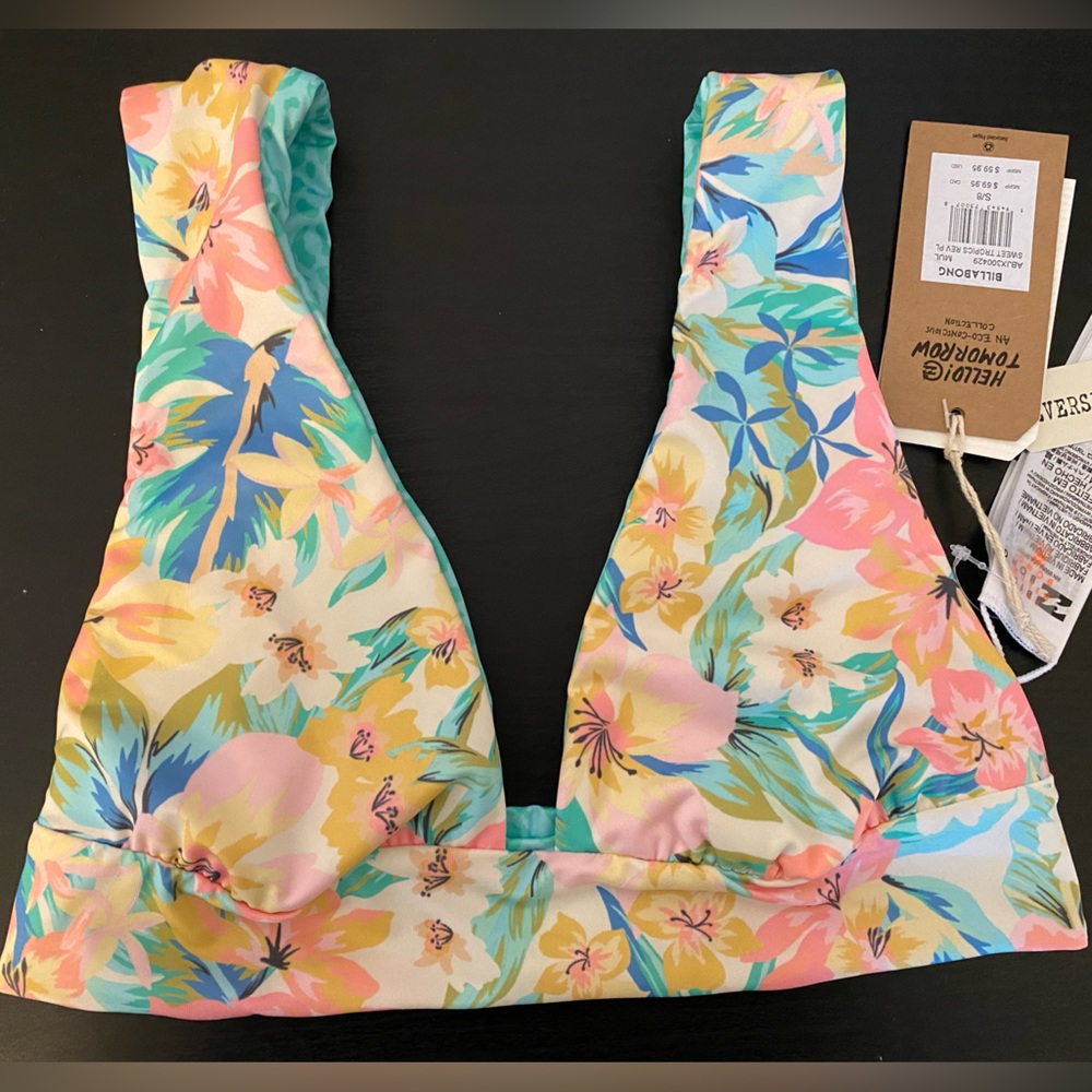 NEW! Bikini Top size small. Reversible floral and blue animal print.